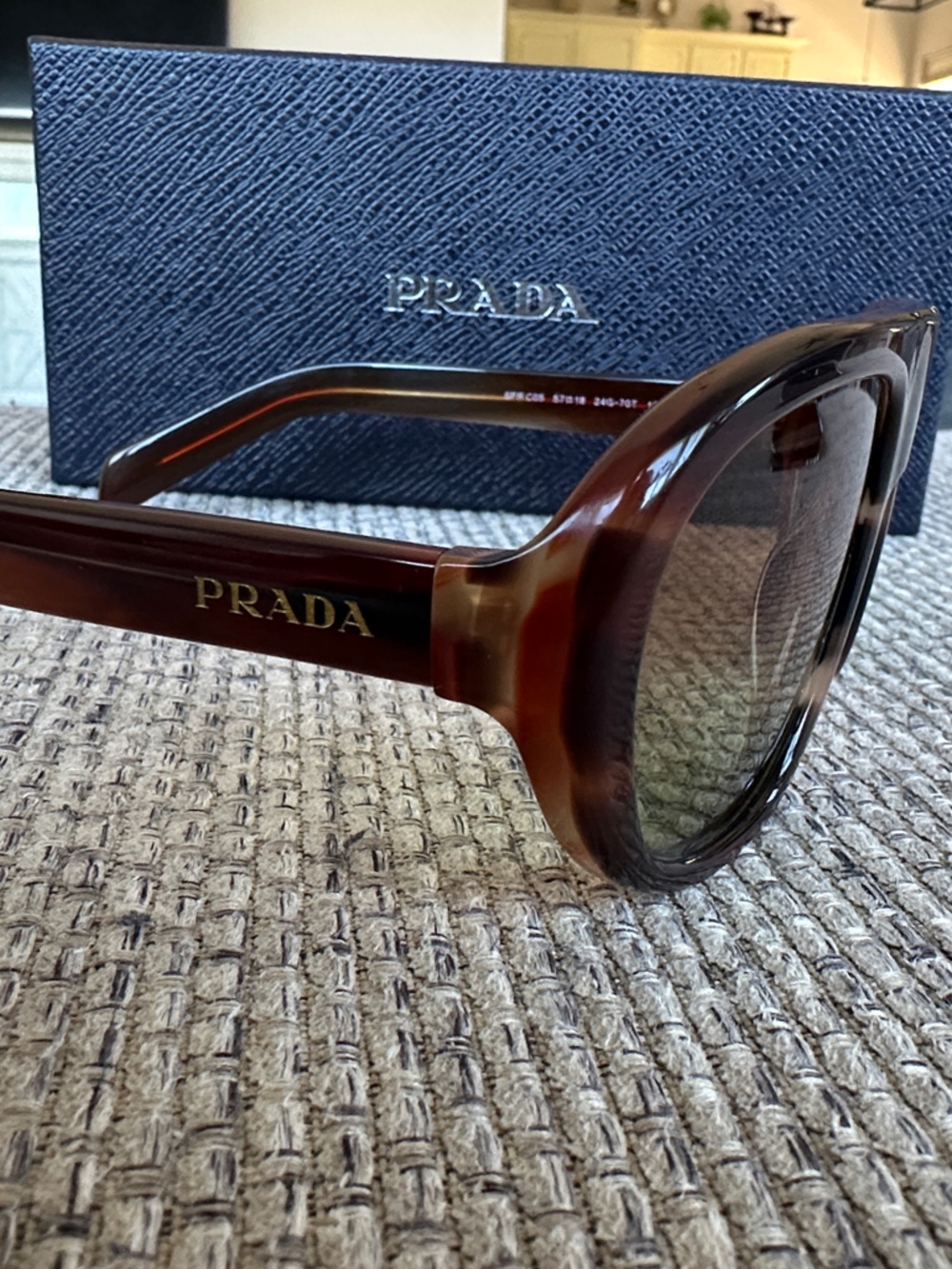 Prada Brown Tortoise Shell Women’s Sunglasses with Gold Logo